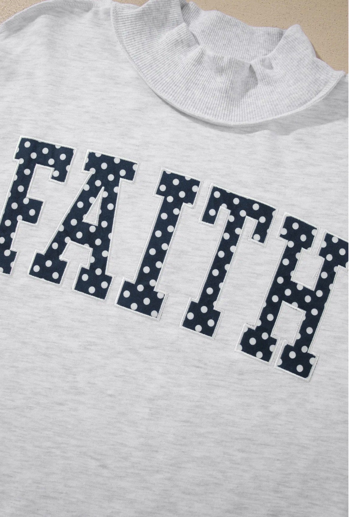 Faith Embroidered Mockneck